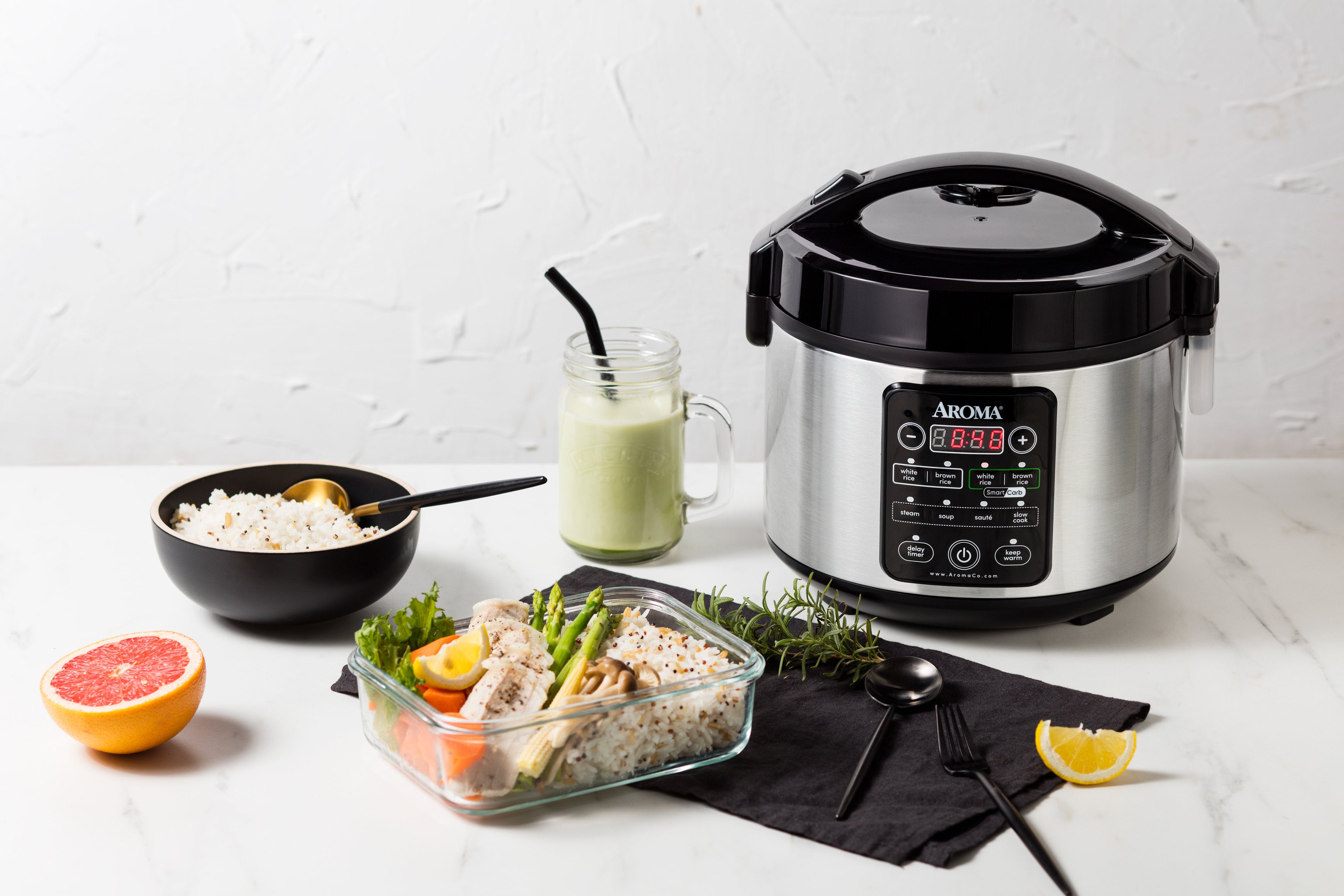 http://forumappliances.com/cdn/shop/articles/aroma-12-cup-cool-touch-cooked-smartcarb-multi-cooker.jpg?v=1643322495
